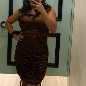 Beautiful adjustable dress for bottom length . Has thin straps wore once